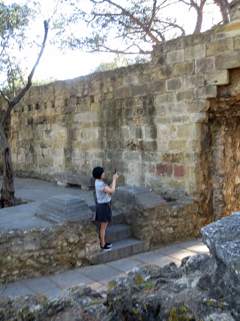 Josie takes a photo of an arch...